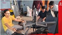 May be an image of 4 people, drill press, hand drill, grinder, foundry and text that says "AJAL ICWDAK 2023 Telkor University"
